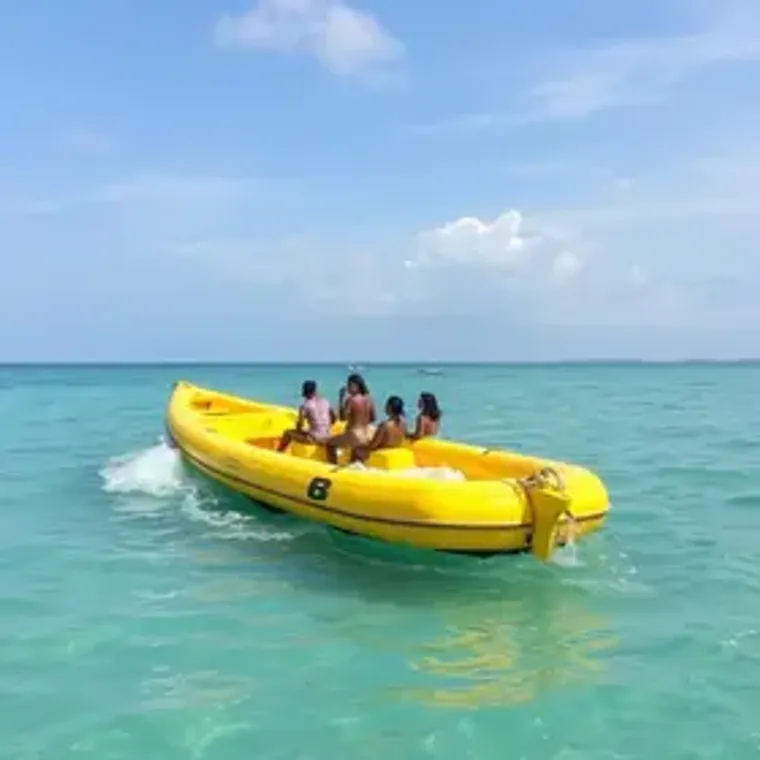 Boat tours near Praia de Camburi: curated travel ideas for visitors